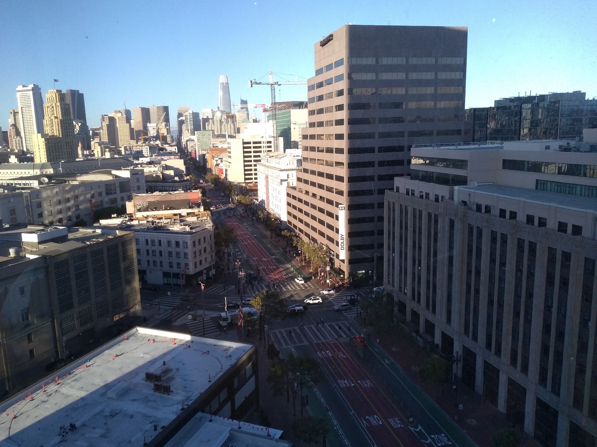 View along the street from the 12th floor, with lots of skyscrapers.
