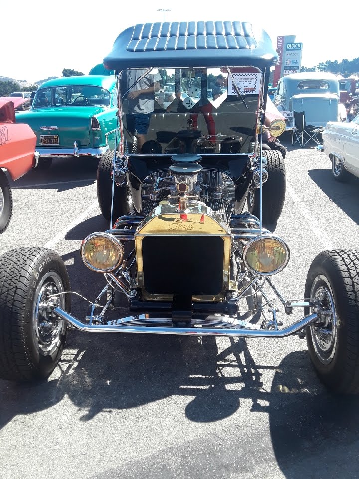 A souped-up Model-T-type car with lots of chrome.