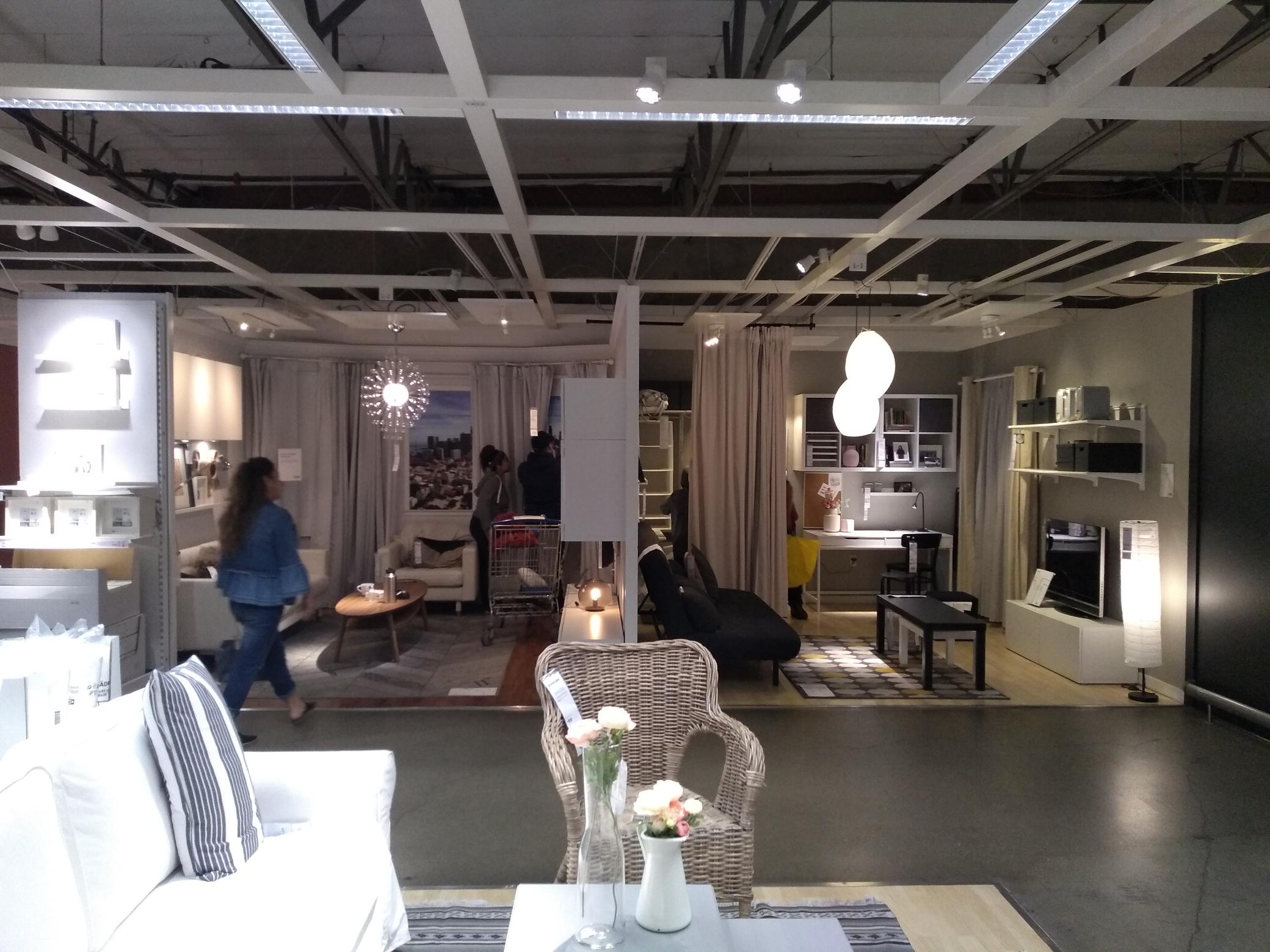 A pair of demonstration rooms furnished in Swedish Modern.