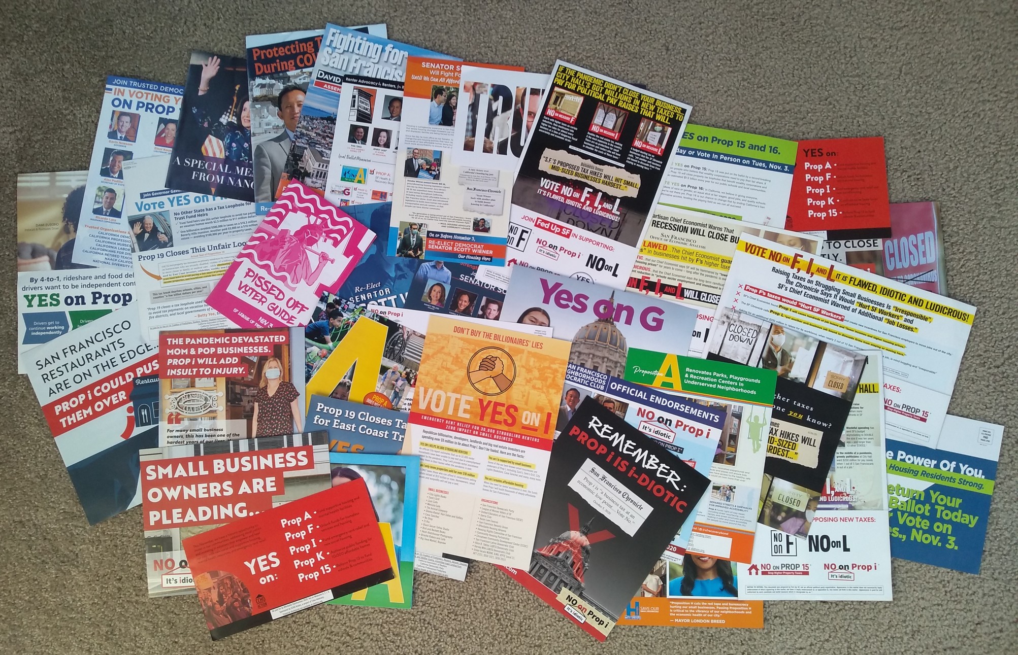 A medley of several dozen colorful flyers and mailers, arguing for and against various candidates and propositions.